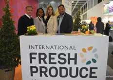 International representation at the IFPA booth. Smiling for the photo are Ivan Correa (Chile), Valeska De Oliveira Cire (Brazil), Jane Strijdom (South Africa), and Ruben Ramirez (Mexico).